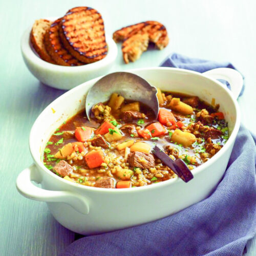 Beef and beer stew with crusty garlic bread