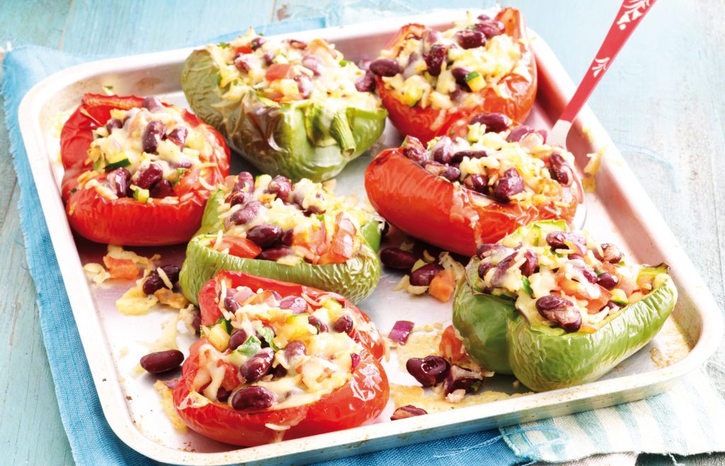 Cheesy rice and bean-stuffed capsicums Cheesy rice and bean-stuffed capsicums