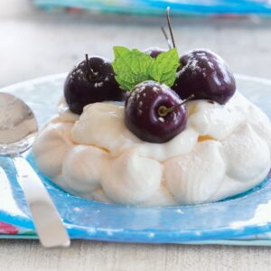 Cherry-topped meringue nests