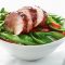 Chinese barbecued pork with stir-fried greens