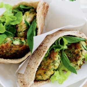 Courgette fritter-filled pitas with tzatziki