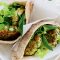 Courgette fritter-filled pitas with tzatziki