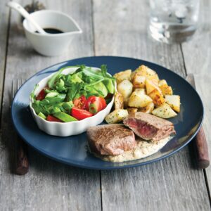 Mustard steak with tasty veg and salad