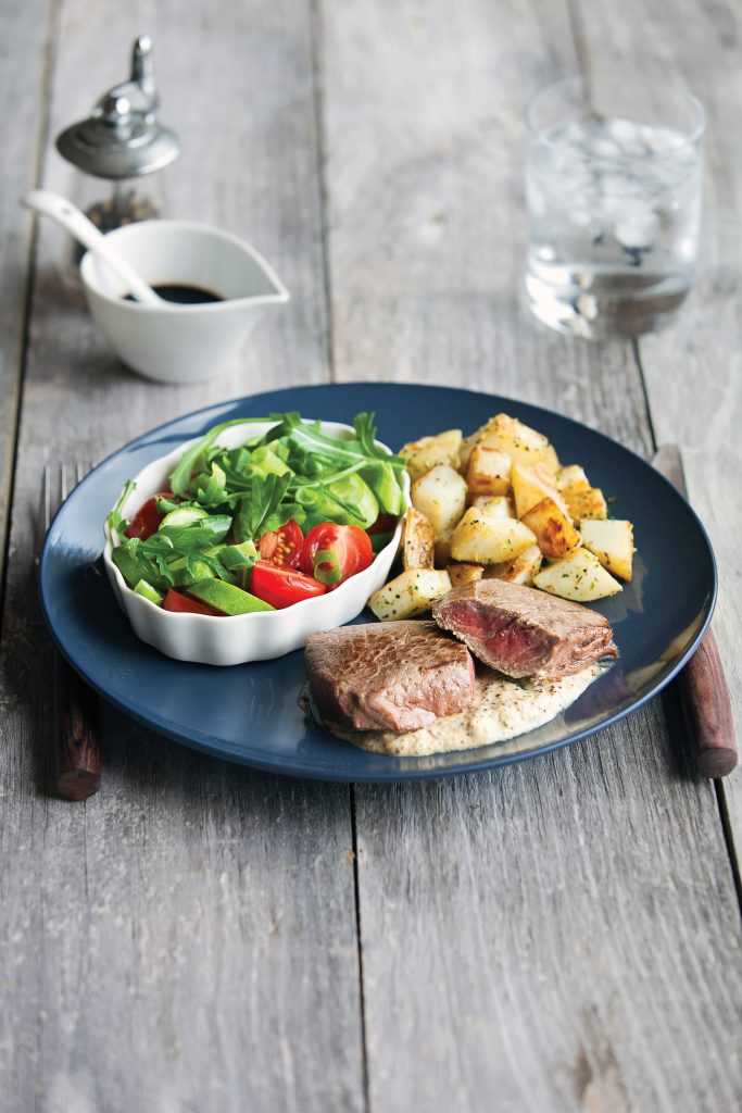 Mustard steak with tasty veg and salad