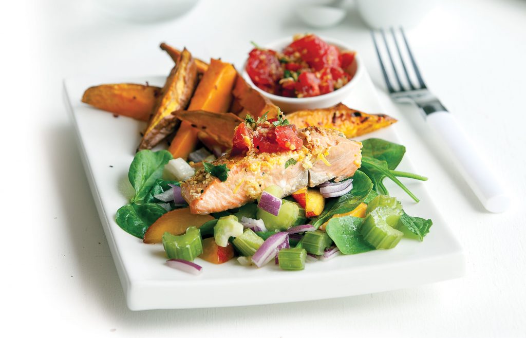 Chermoula-topped salmon with kumara fries and salad Chermoula-topped salmon with kumara fries and salad