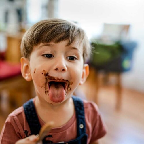 Little boy with chocolate on his face