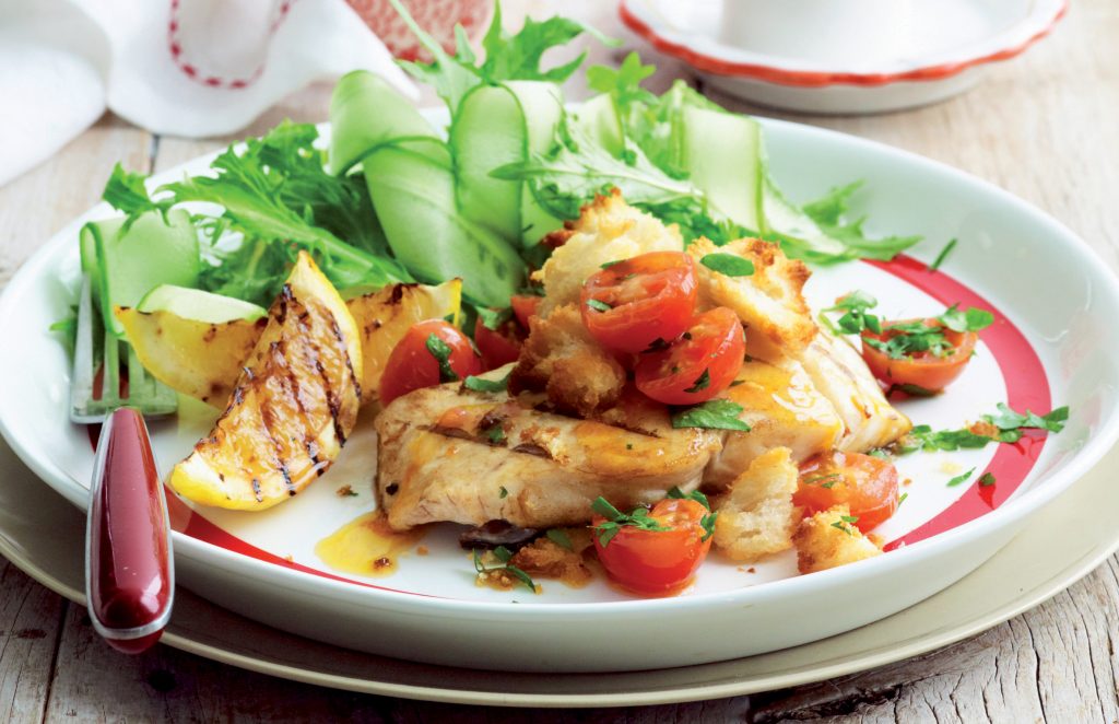 Fish with tomato and garlic crumbs