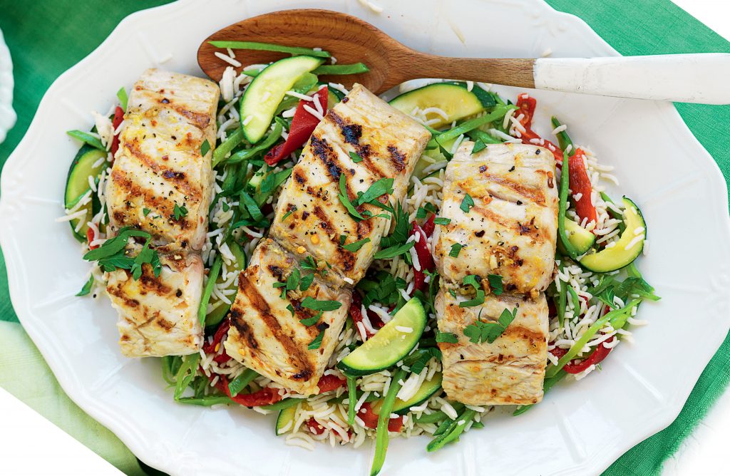 Grilled piri piri fish with warm rice salad Grilled piri piri fish with warm rice salad