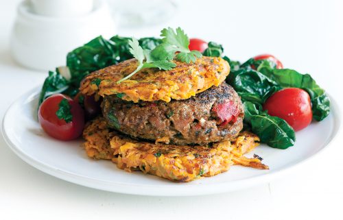 Lamb burgers with kumara fritters and silver beet