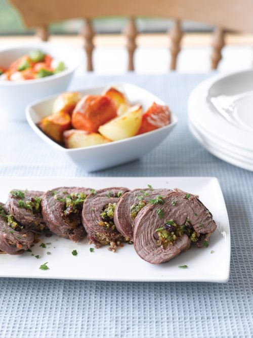 Roast lamb with fruity garlic stuffing