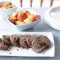 Roast lamb with fruity garlic stuffing