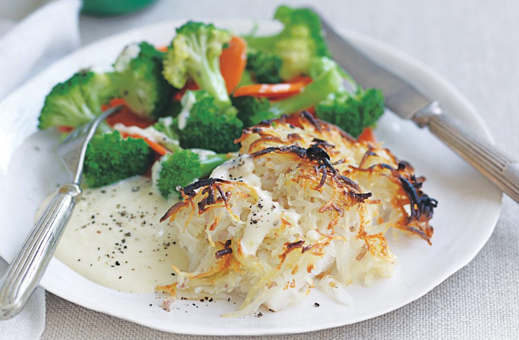 Rosti-topped fish with cheese sauce