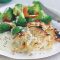Rosti-topped fish with cheese sauce