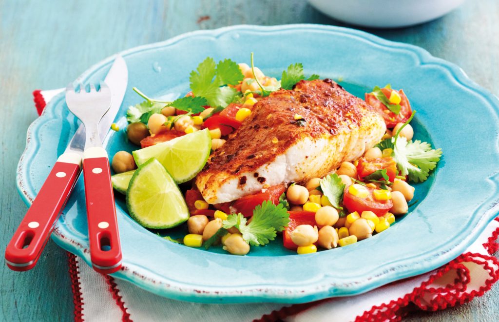 Spice-rubbed fish with roasted corn and tomato salad Spice-rubbed fish with roasted corn and tomato salad
