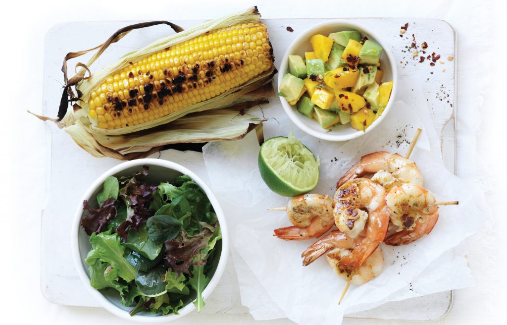 Barbecued prawn skewers with corn and mango chilli salsa Barbecued prawn skewers with corn and mango chilli salsa