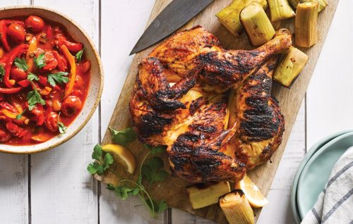 Butterflied harissa chicken with barbecued leek and lemon pepper sauce