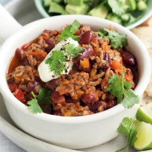 Chilli con carne with avocado salsa