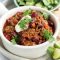 Chilli con carne with avocado salsa