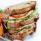Grilled chicken club sandwich with kumara wedges