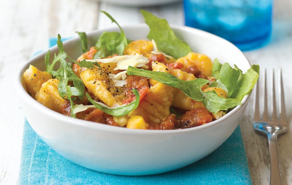 Kumara gnocchi with walnuts and tomato sauce