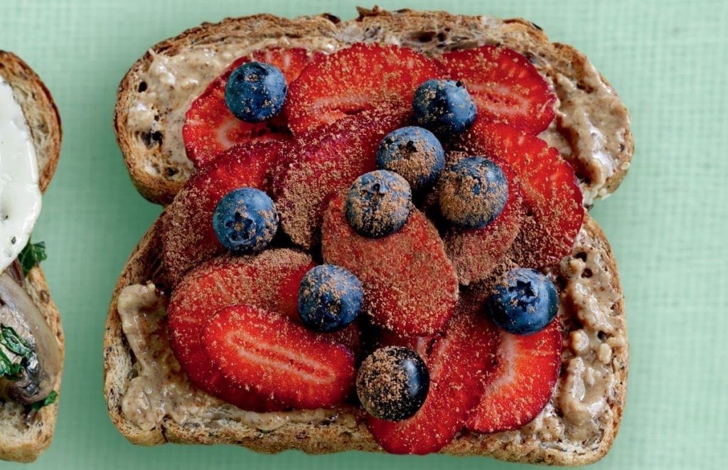 Nut butter, berries and cocoa toast topper Nut butter, berries and cocoa toast topper