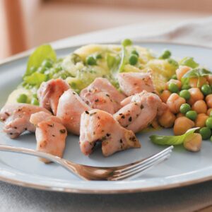 Pan-fried chicken with pea polenta