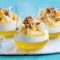 Passionfruit, pineapple and mango cheesecake pots