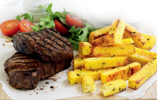 Pepper steak with herb and parmesan polenta chips