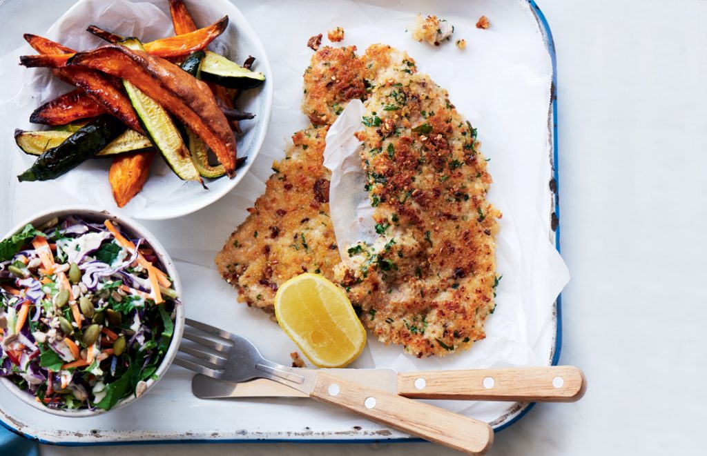 Pork schnitzel with courgette and kumara wedges Crumbed pork schnitzel