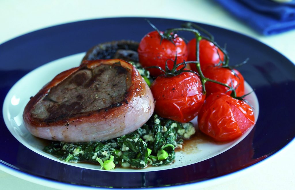 Prosciutto-wrapped beef with creamy silver beet Prosciutto-wrapped beef with creamy silver beet