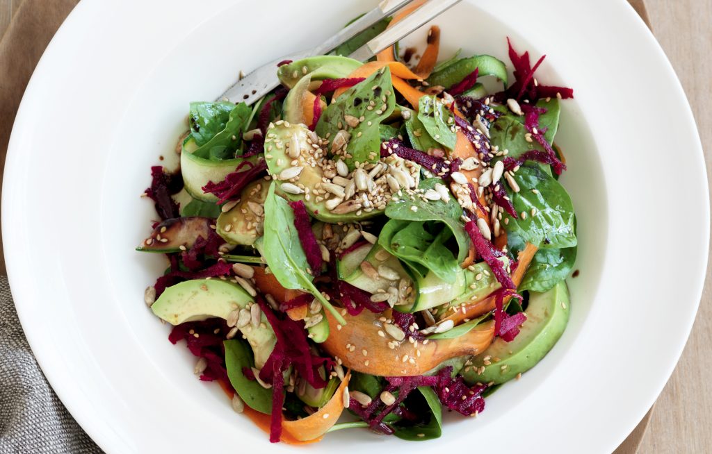 Raw vege side salad with avocado and seeds Raw vege side salad with avocado and seeds