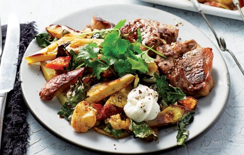 Roasted cauliflower and kumara tray bake with pomegranate dressing