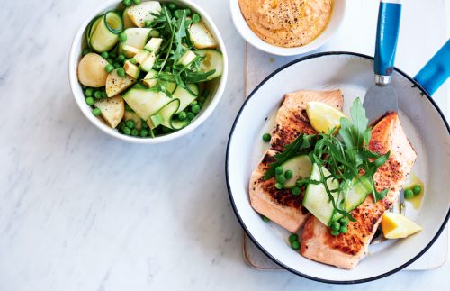 Salmon with spring salad and pumpkin hummus