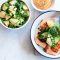 Salmon with spring salad and pumpkin hummus