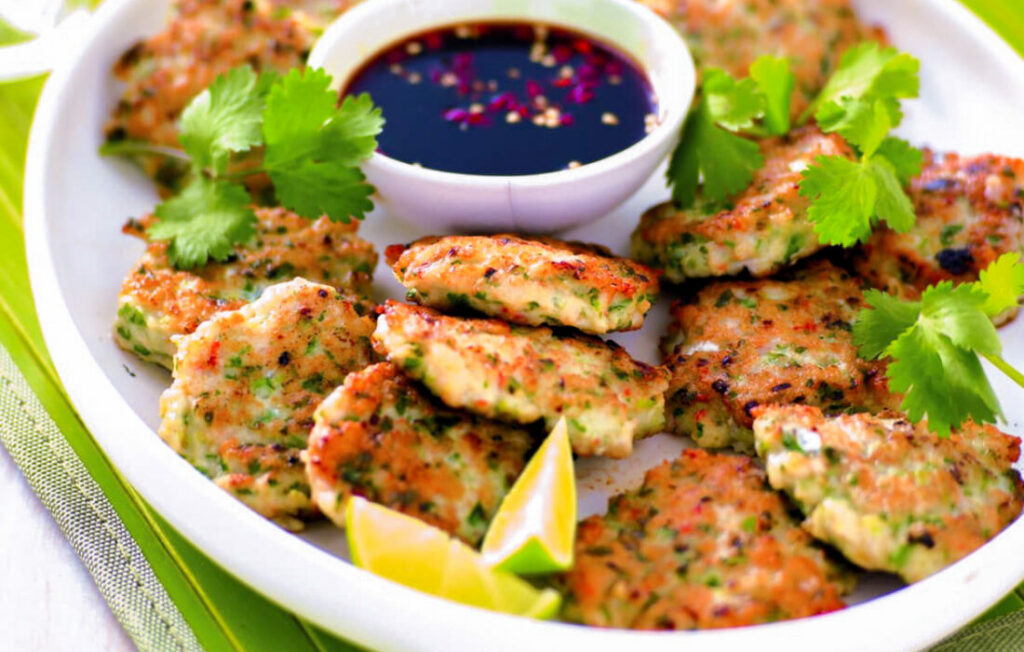 Seafood and coriander patties with chilli dipping sauce