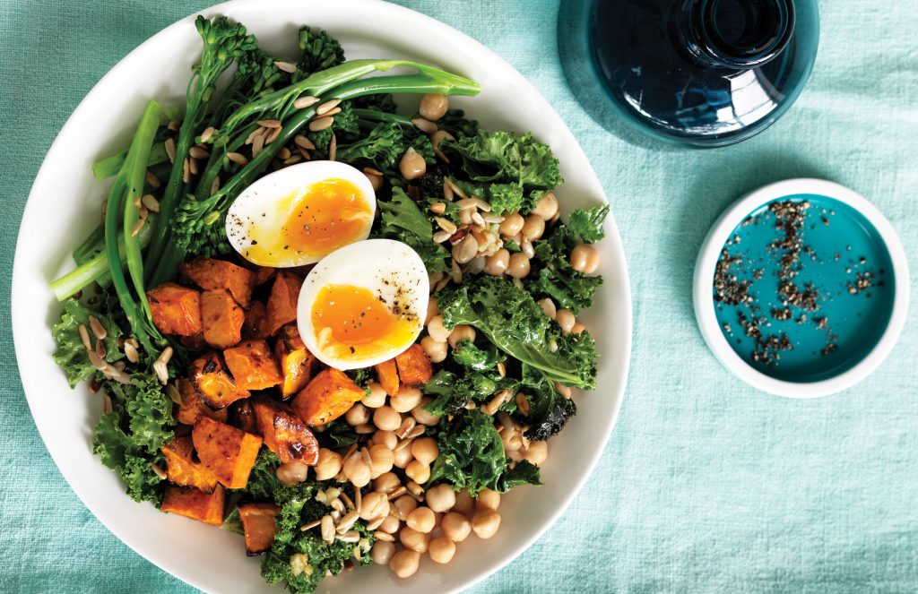 Wilted garlic, kale, chickpea, broccolini and soft-boiled egg bowl Wilted garlic, kale, chickpea, broccolini and soft-boiled egg bowl