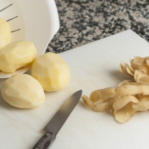 Are green potatoes toxic and does peeling help?