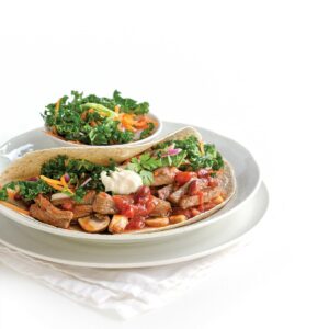 Beef and bean fajitas with carrot and kale slaw