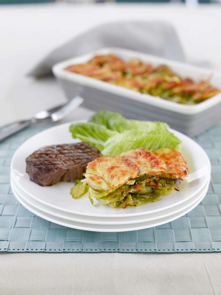Beef steaks with Brussels sprout and potato gratin Beef steaks with Brussels sprout and potato gratin