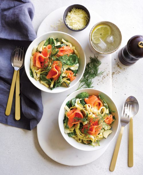Creamy pasta with peas, courgette, Brussels sprouts and salmon