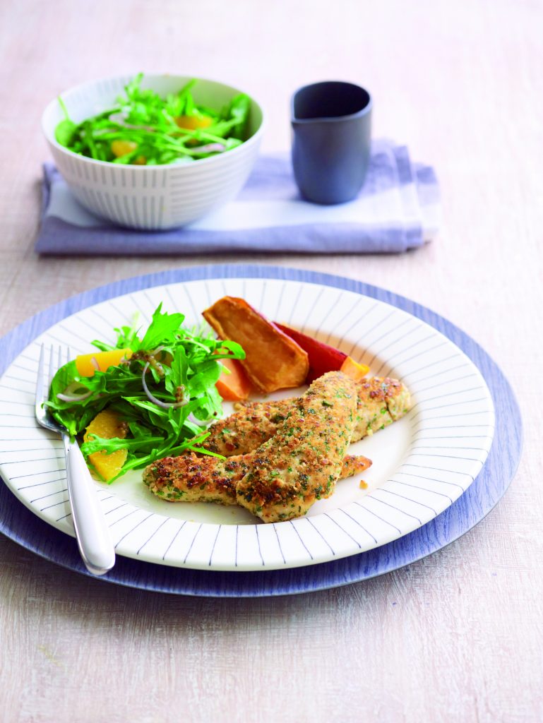 Crumbed chicken with rocket salad and wedges Crumbed chicken with rocket salad and wedges