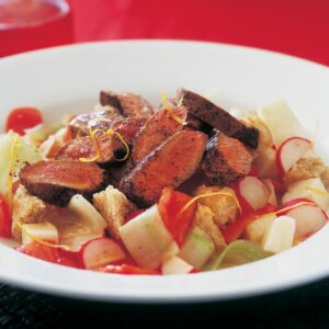 Cucumber, tomato and goats’ cheese salad with grilled lamb