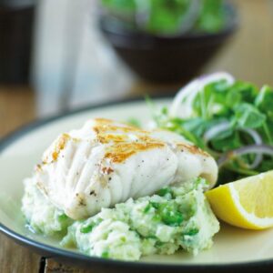 Fish with cheesy pea mash