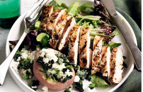 Garlic chicken with spinach and feta-stuffed potatoes