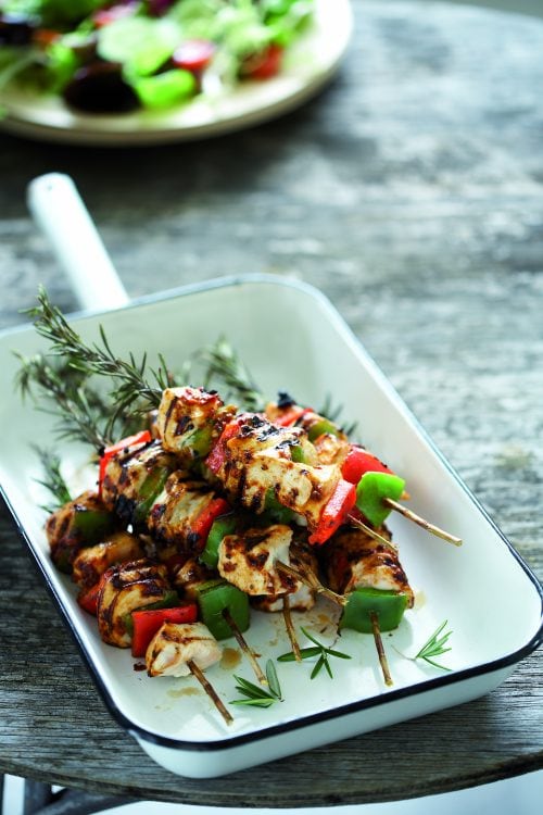 Grilled chicken on rosemary skewers