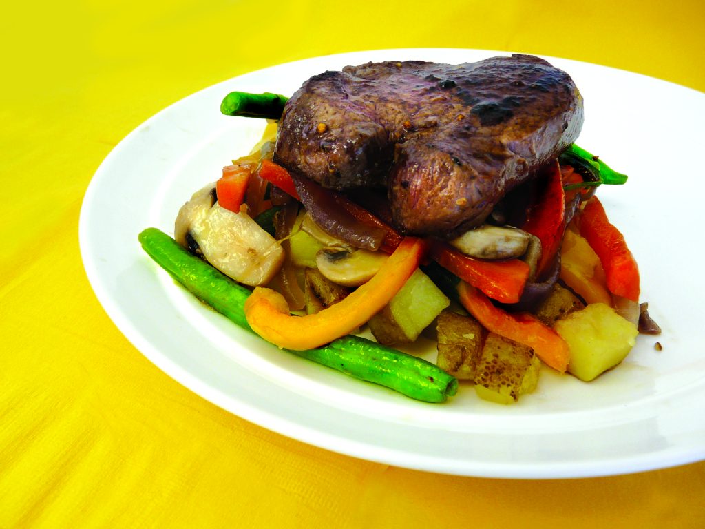 Grilled fillet with spud roasties and sautéed veges