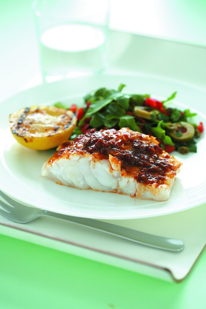 Grilled fish and lemon with olive salad Grilled fish and lemon with olive salad