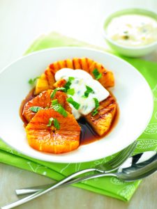 Grilled fruit in mint and citrus syrup