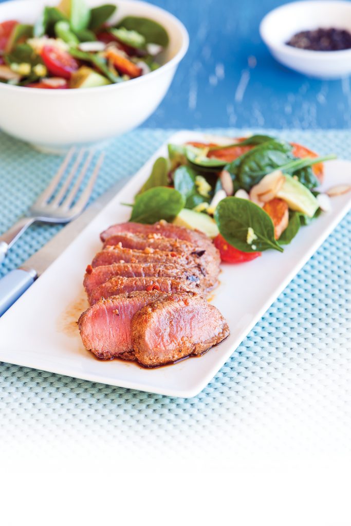 Harissa lamb with kumara and avocado salad