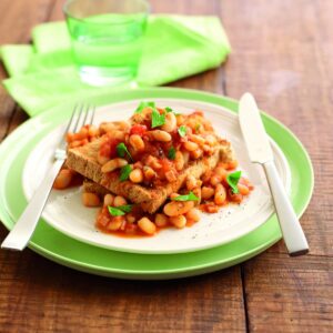 Homemade baked beans and ham on toast